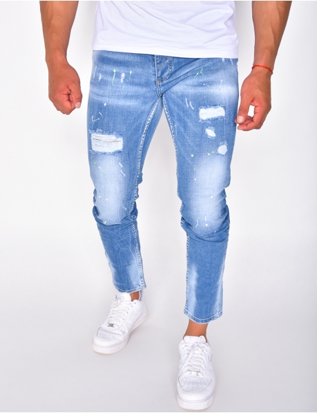 Men's ripped jeans with paint flecks