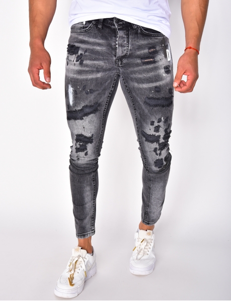 Jeans in Destroyed-Optik mit Flecken 