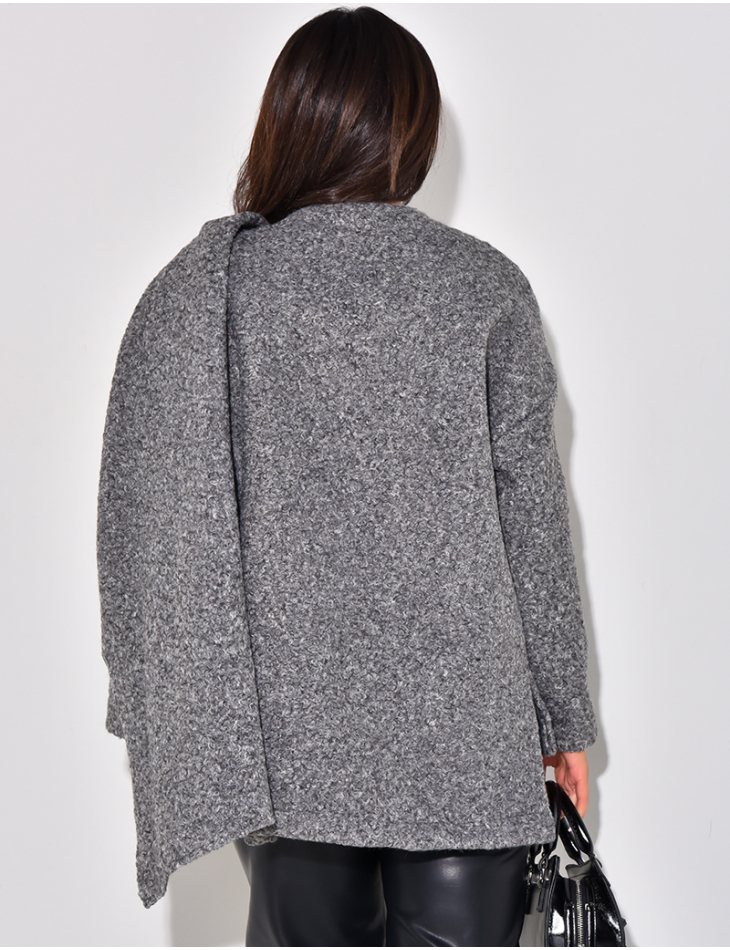   Loose-fitting curly wool scarf-effect cape